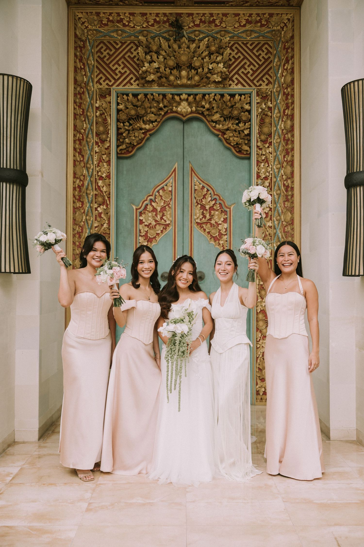 Bride with her bridesmaids during a Bali destination wedding photoshoot