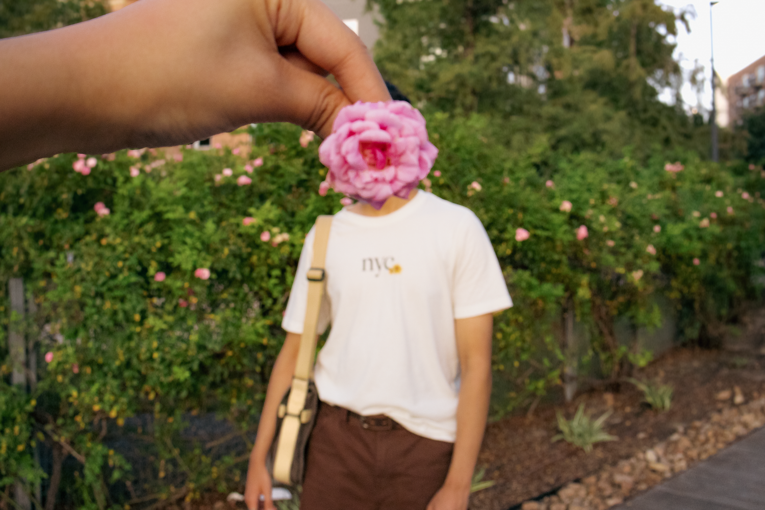 Man flower trend in front of face