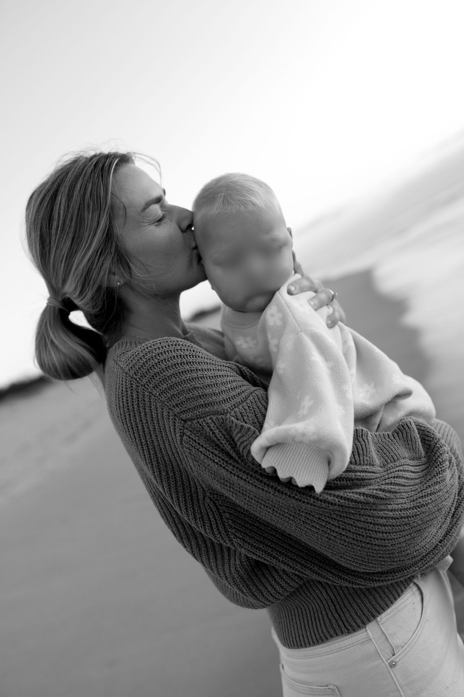 Tender connection between mother and toddler captured through documentary photography
