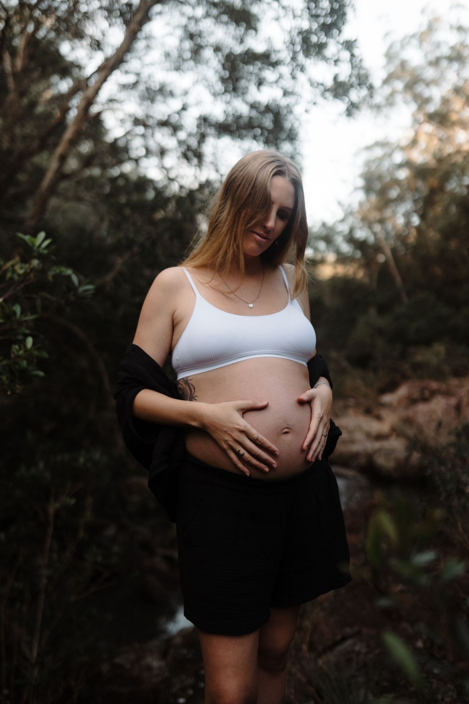 Authentic maternity moment celebrating the journey into motherhood