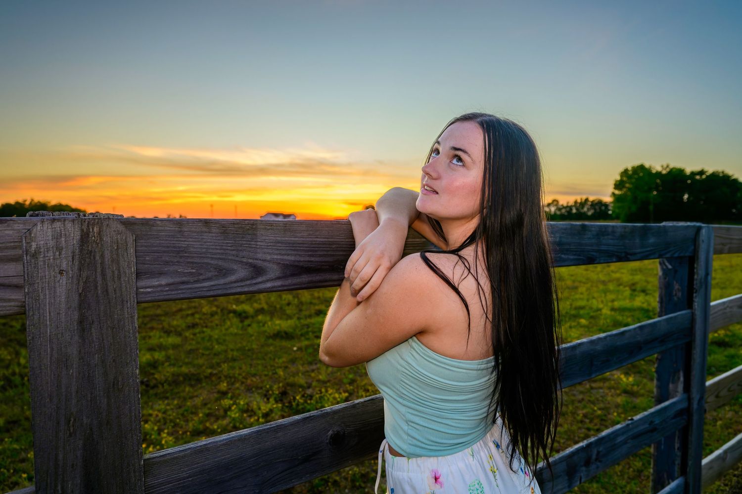 Outdoor lifestyle portrait of a woman photographed at sunset