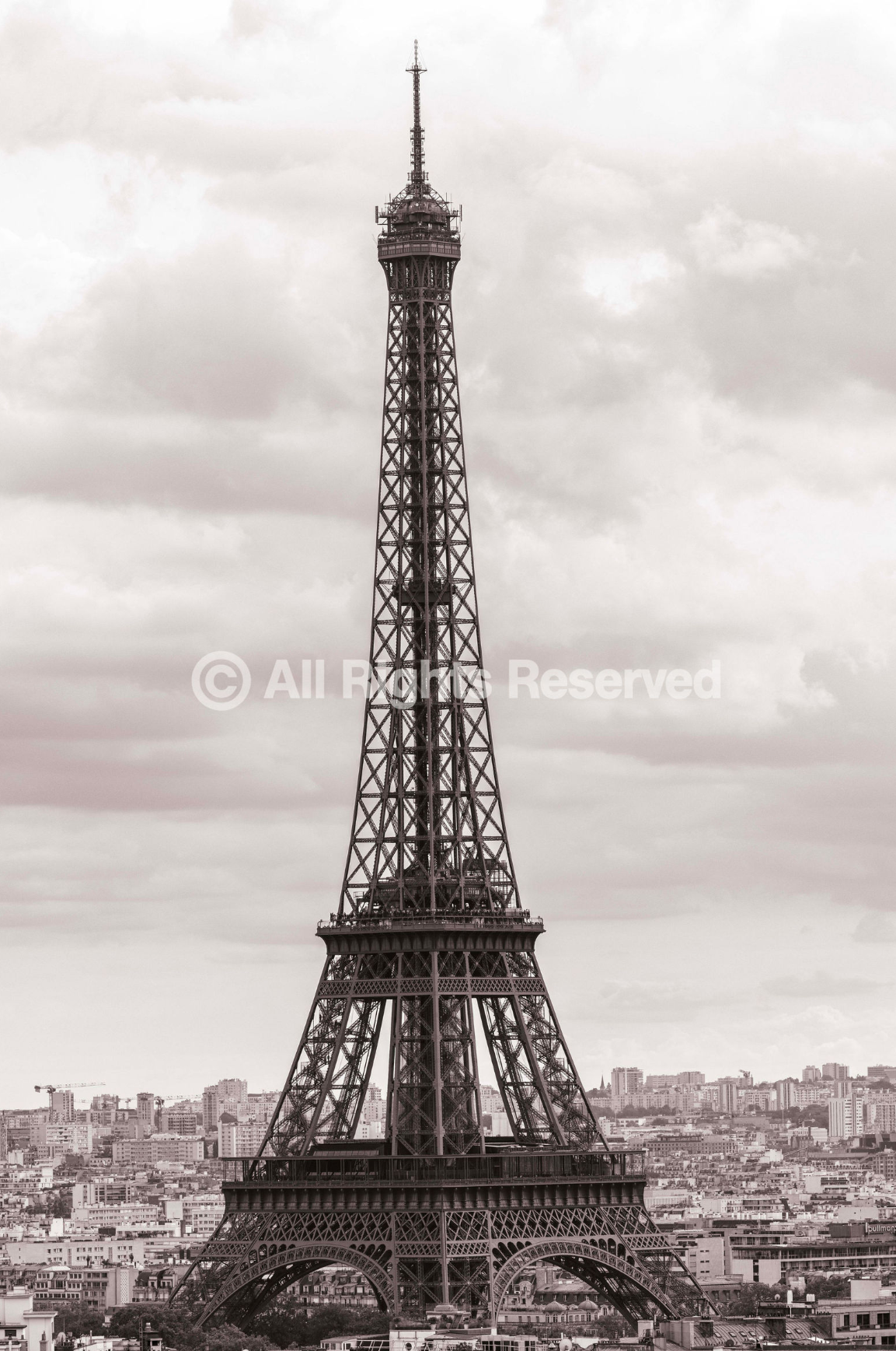 Black and white panoramic sequence showing progressive construction stages of the Eiffel Tower against the Paris skyline.