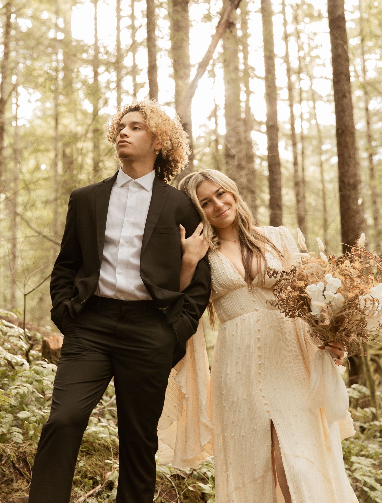Dreamy forest wedding photography with soft natural lighting and vintage elements.