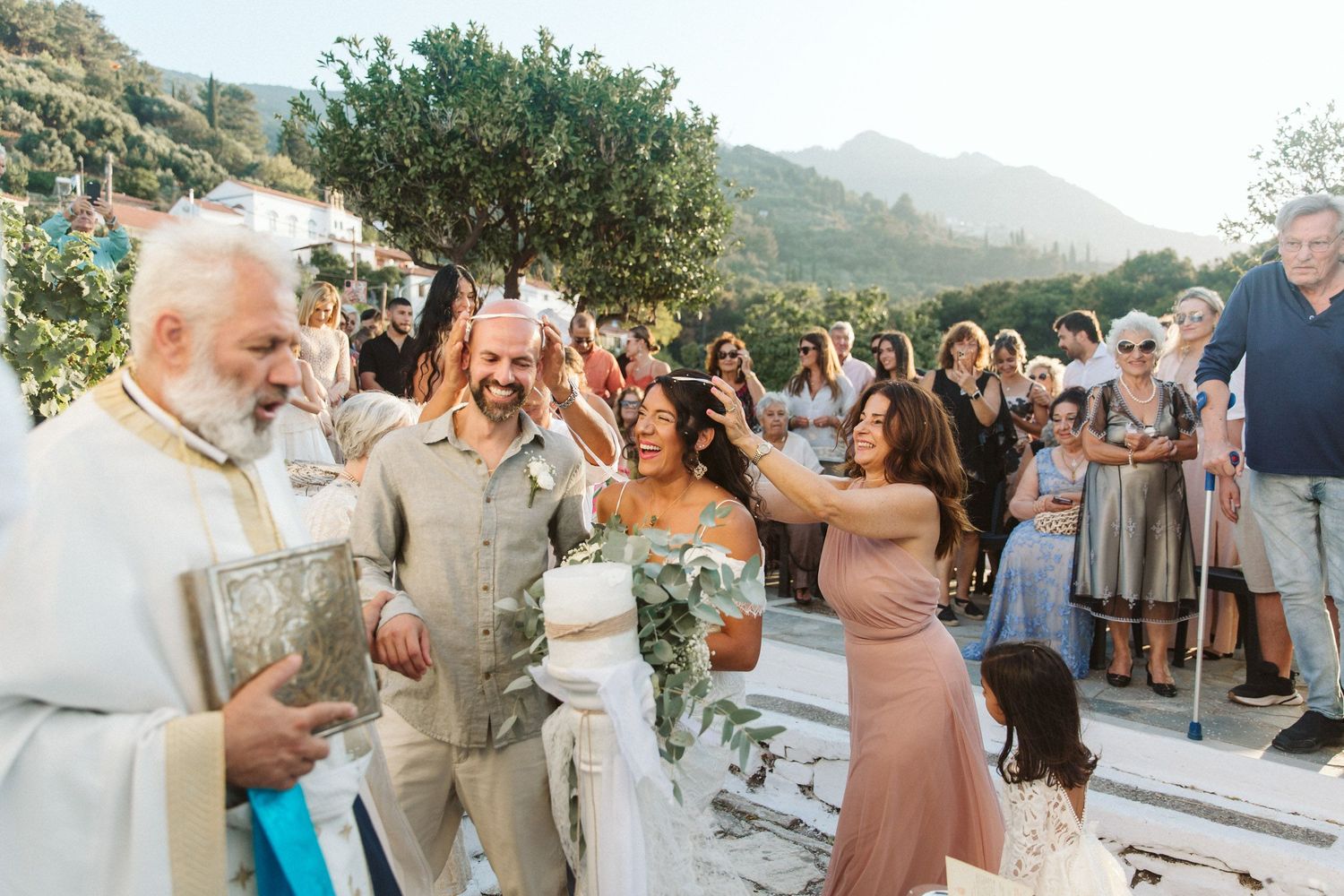 Intimate wedding ceremony in Samos, Greece at sunset