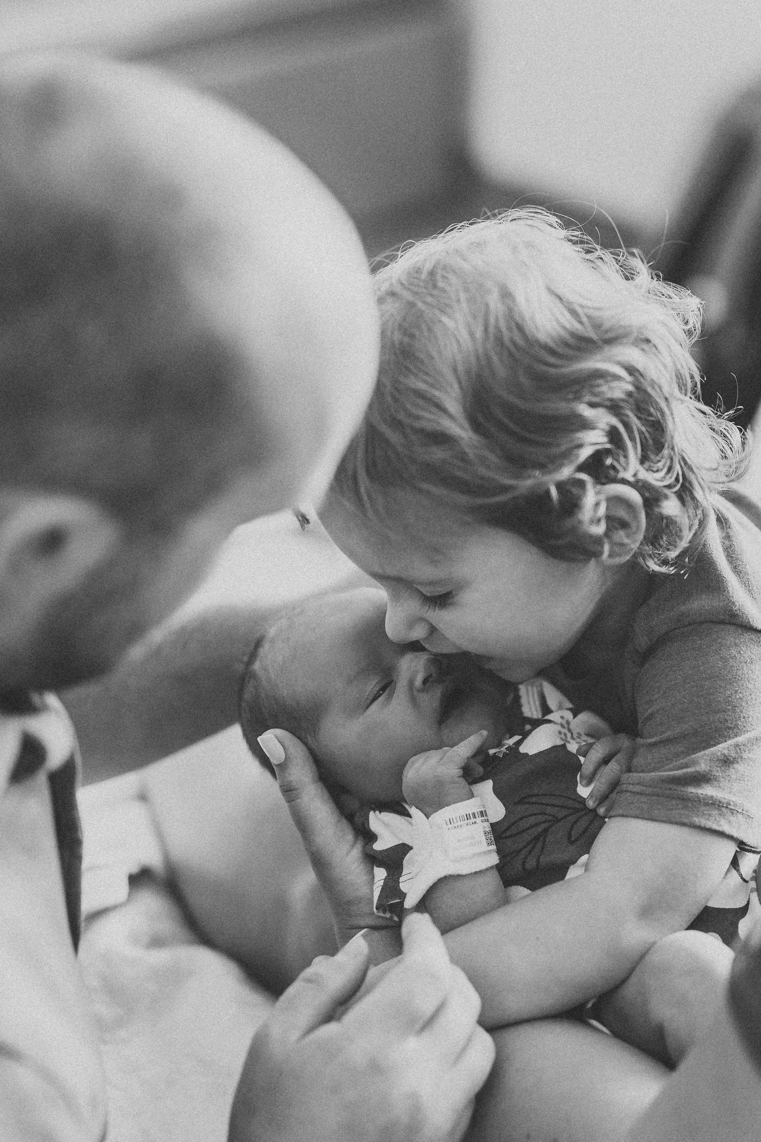 Series of black and white images capturing intimate breastfeeding moments.