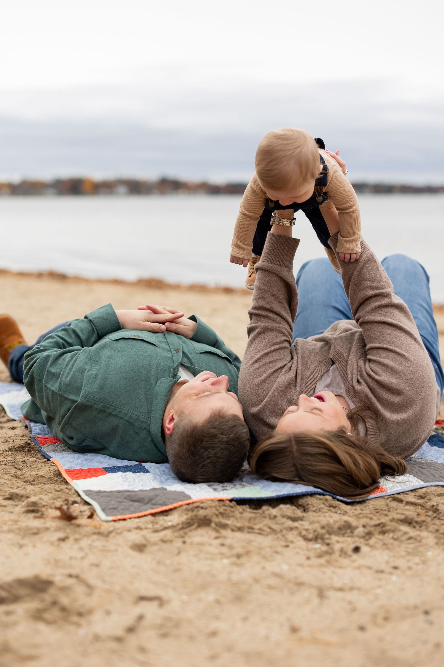 Relaxed moments captured while lying on a blanket at the beach.