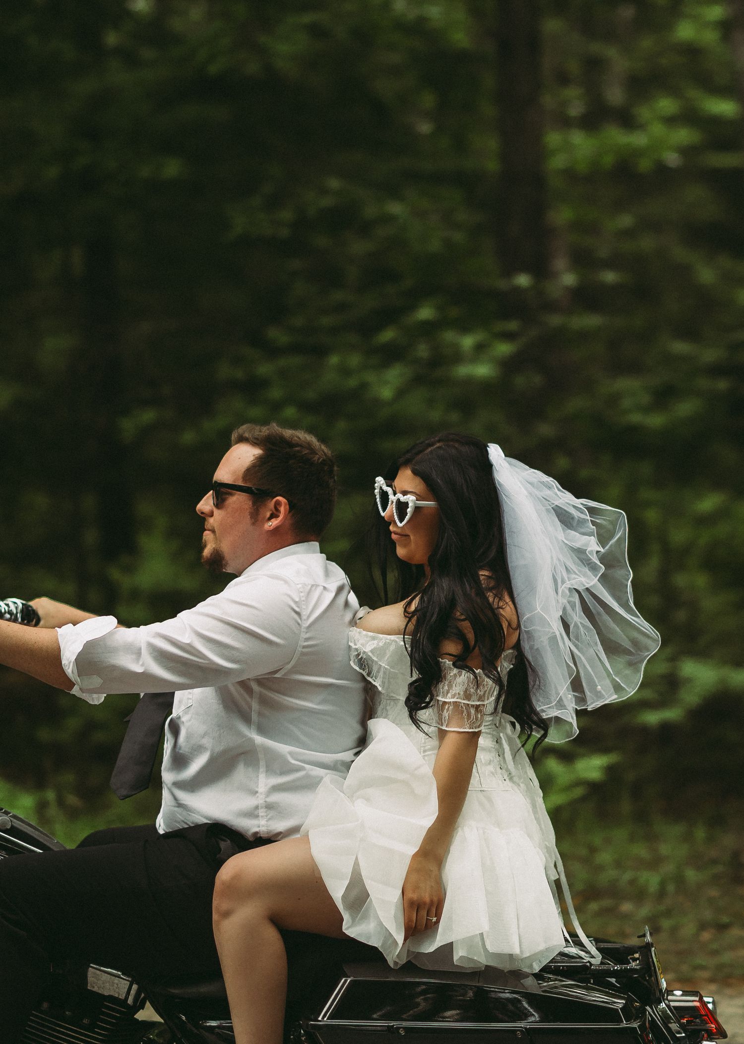 Creative motorcycle photography sequence with sunglasses and flowing fabric.