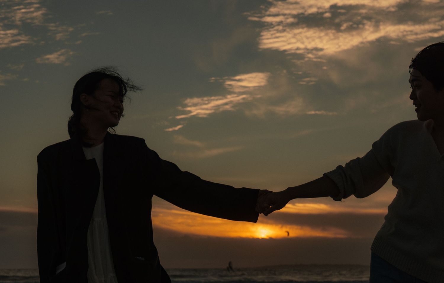 A couple at sunset at the beach