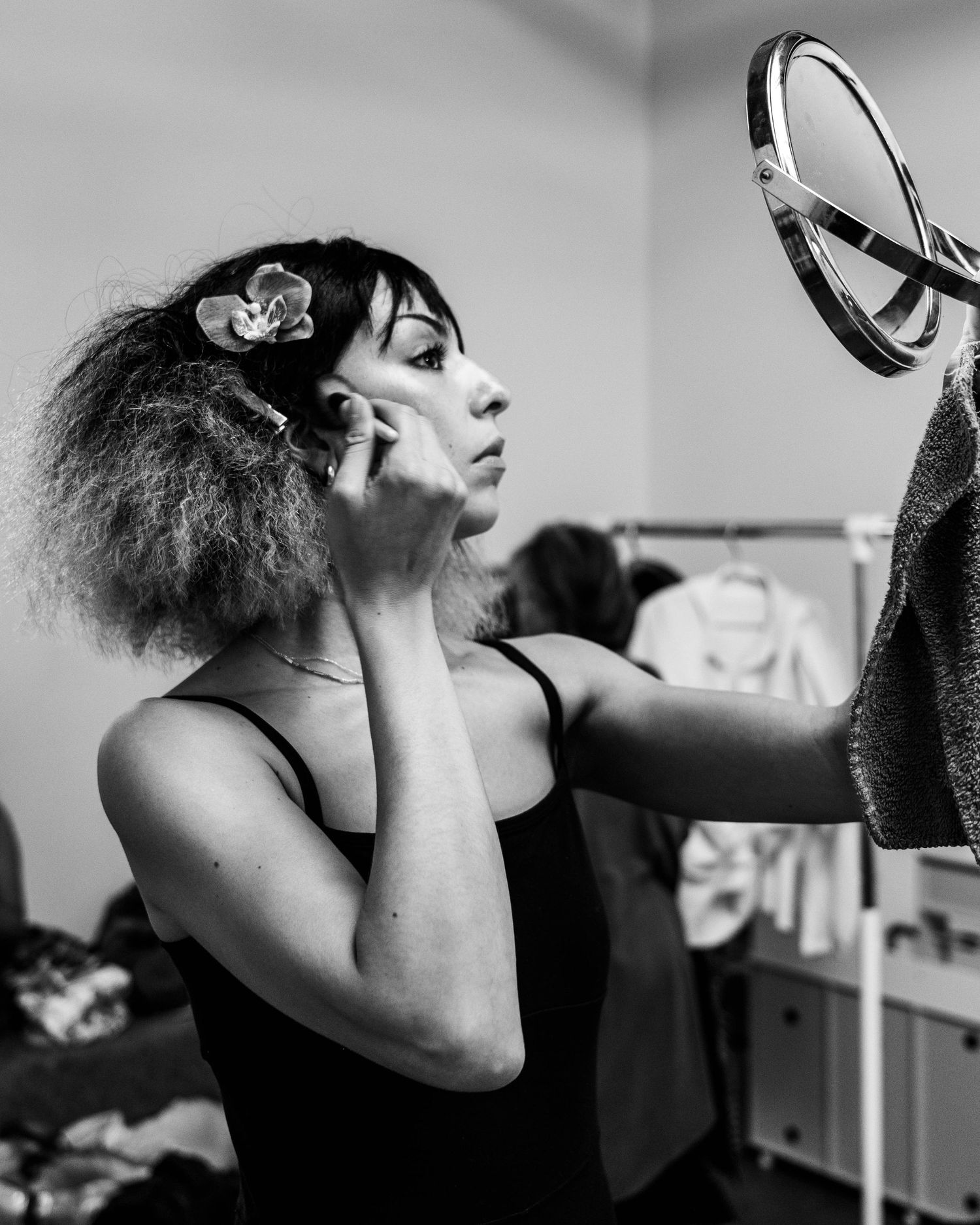 Black and white sequence showing dramatic side profile poses.