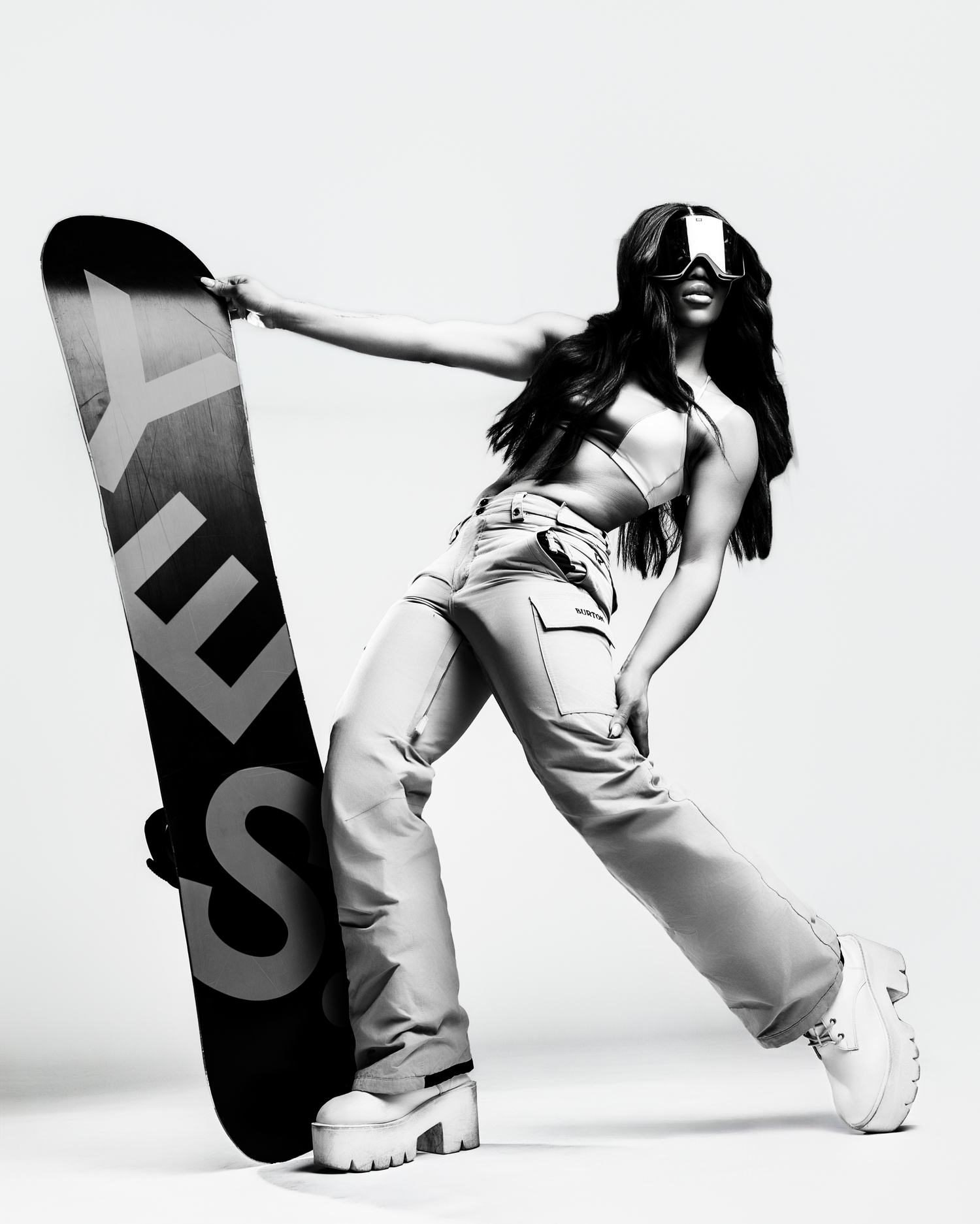 Black and white fashion photography series showing dynamic poses and movement.