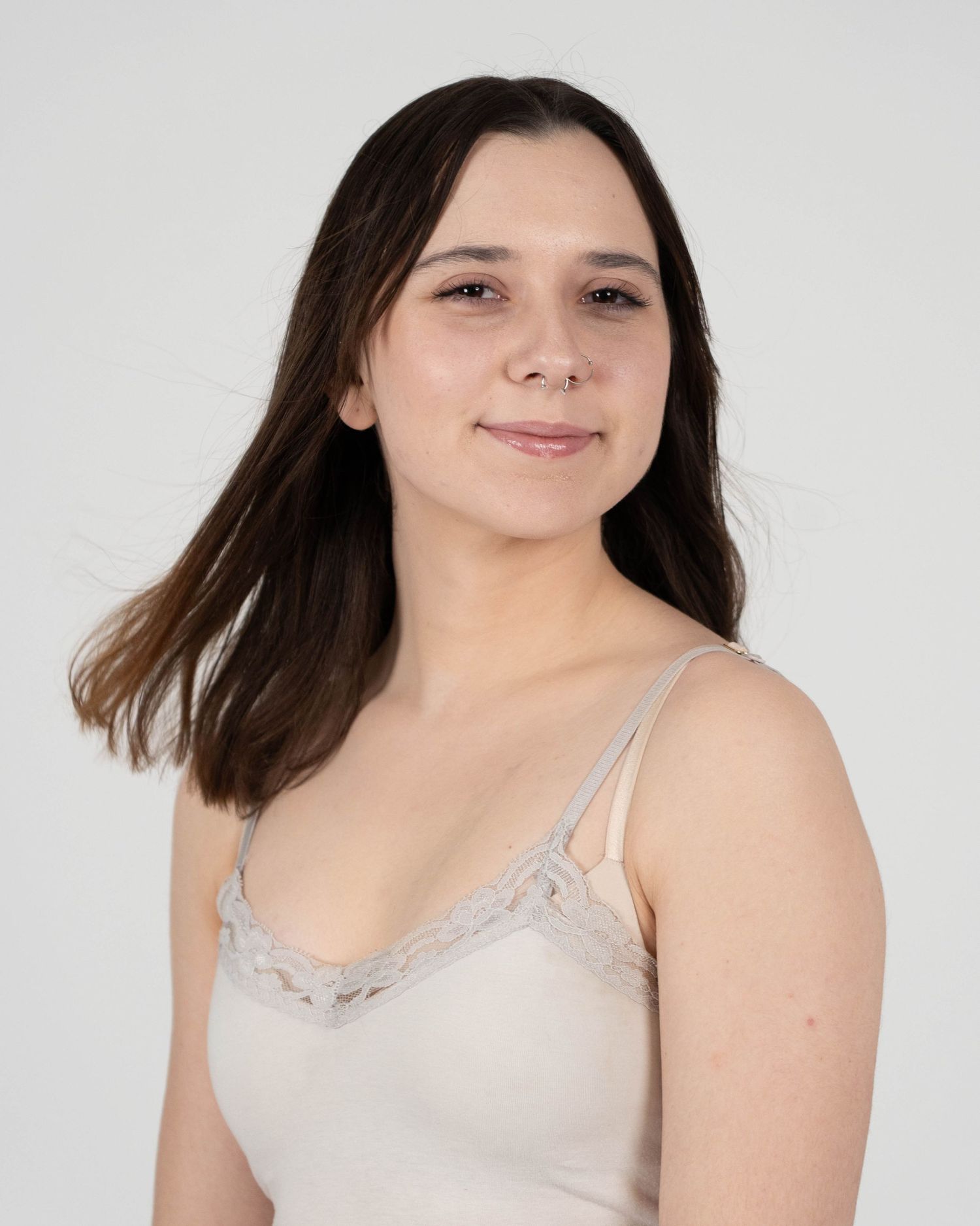 Portrait series in natural lighting wearing light colored camisole.