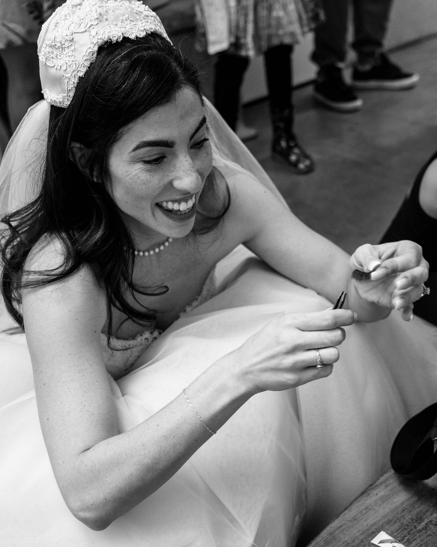 Black and white sequence of joyful moments at a wedding celebration.