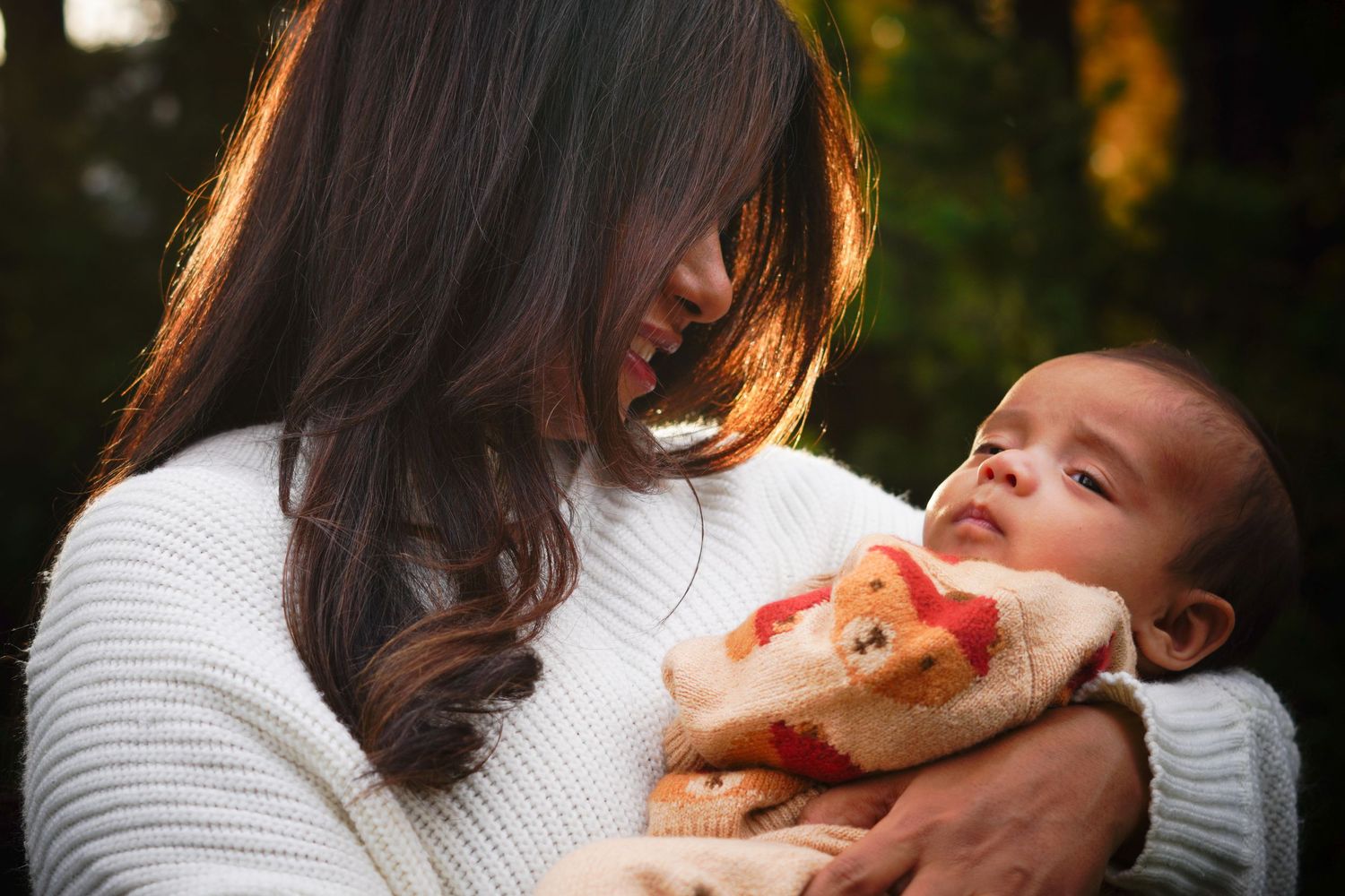 Intimate family moment captured with warm lighting and natural expressions.