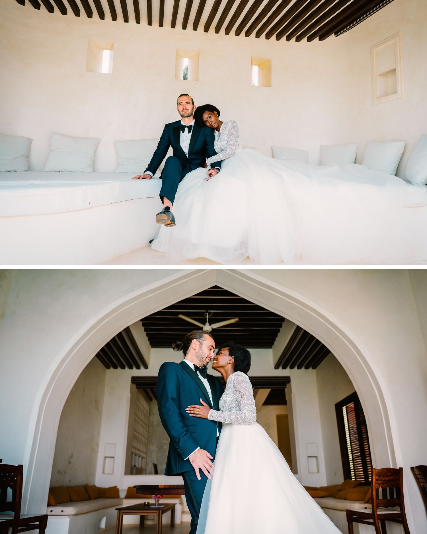 Couple in formal wedding attire sharing an intimate dance in an elegant white arched room with exposed beams.