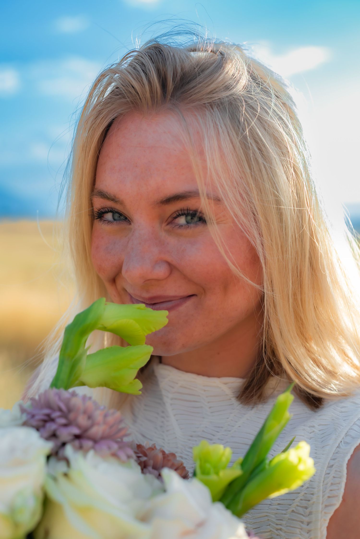 Close-up shots with flowers and natural lighting in outdoor setting.