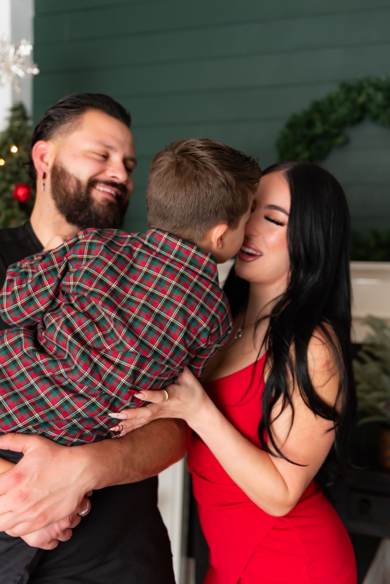 Romantic sequence showing couple in plaid and red embracing.