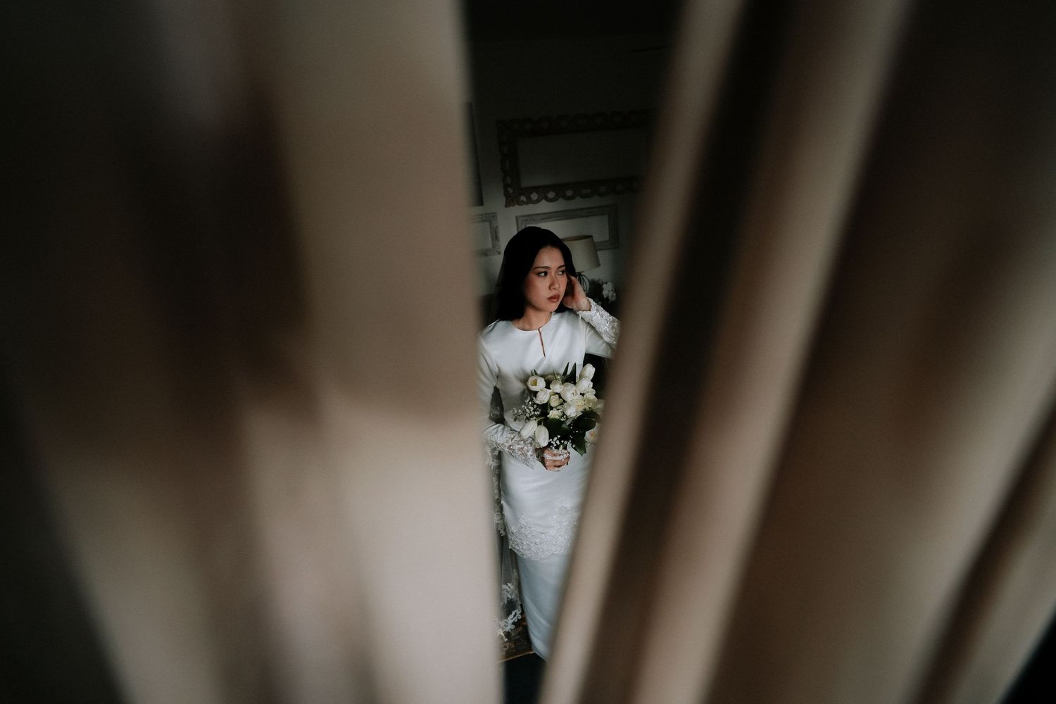 A series of wedding photographs showing romantic moments between newlyweds in an elegant venue setting.