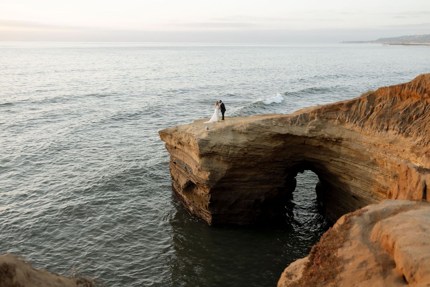 Dramatic coastal cliffs and rock formations overlooking the Pacific Ocean.