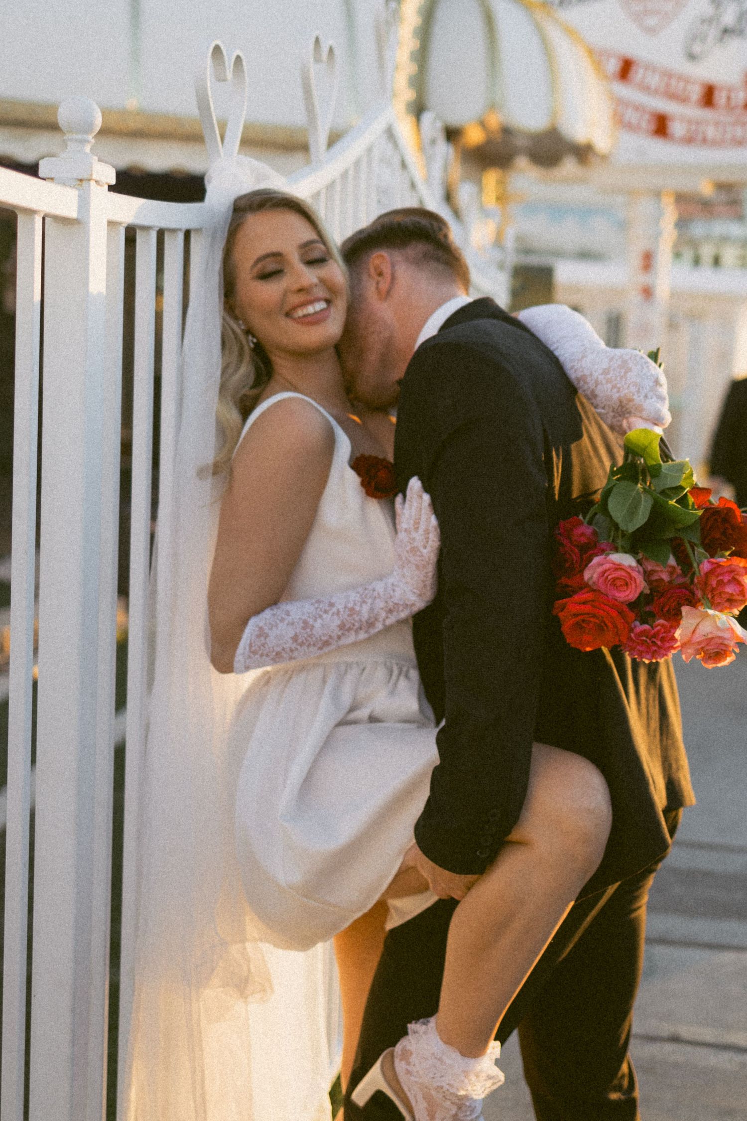 A joyful wedding moment captured outside the Little White Chapel in Vegas.