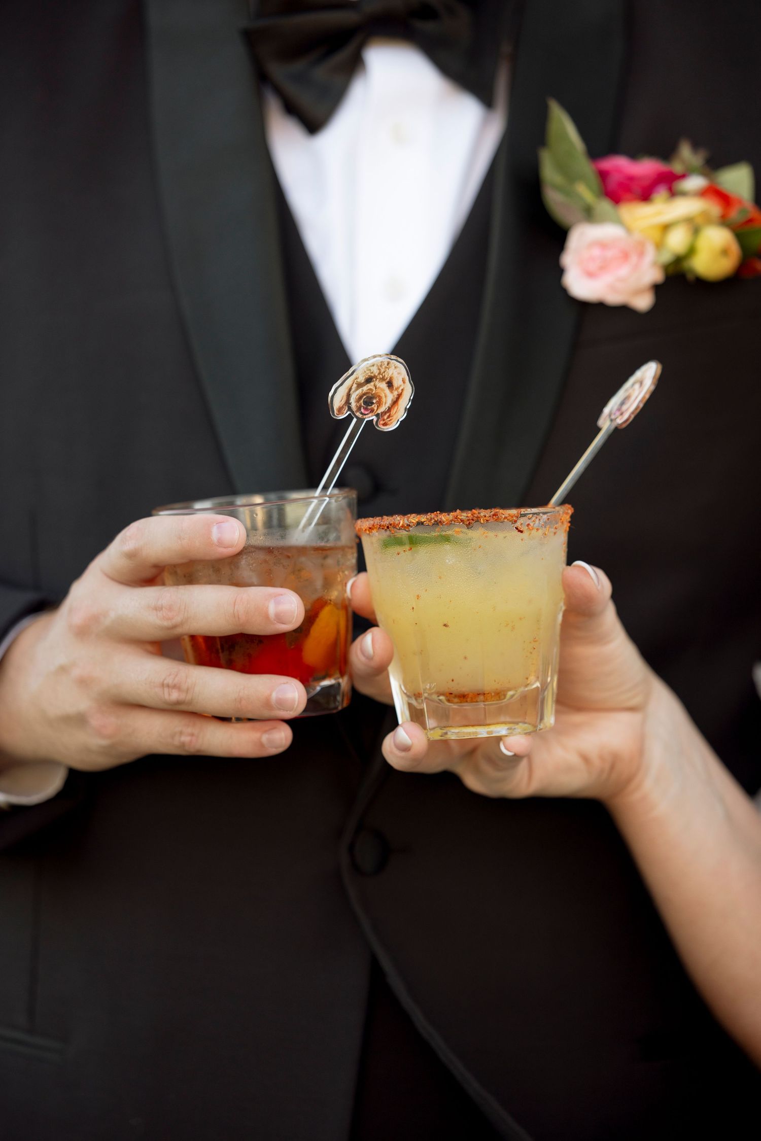 Close-up shots of hands holding various colorful cocktails at a wedding celebration.