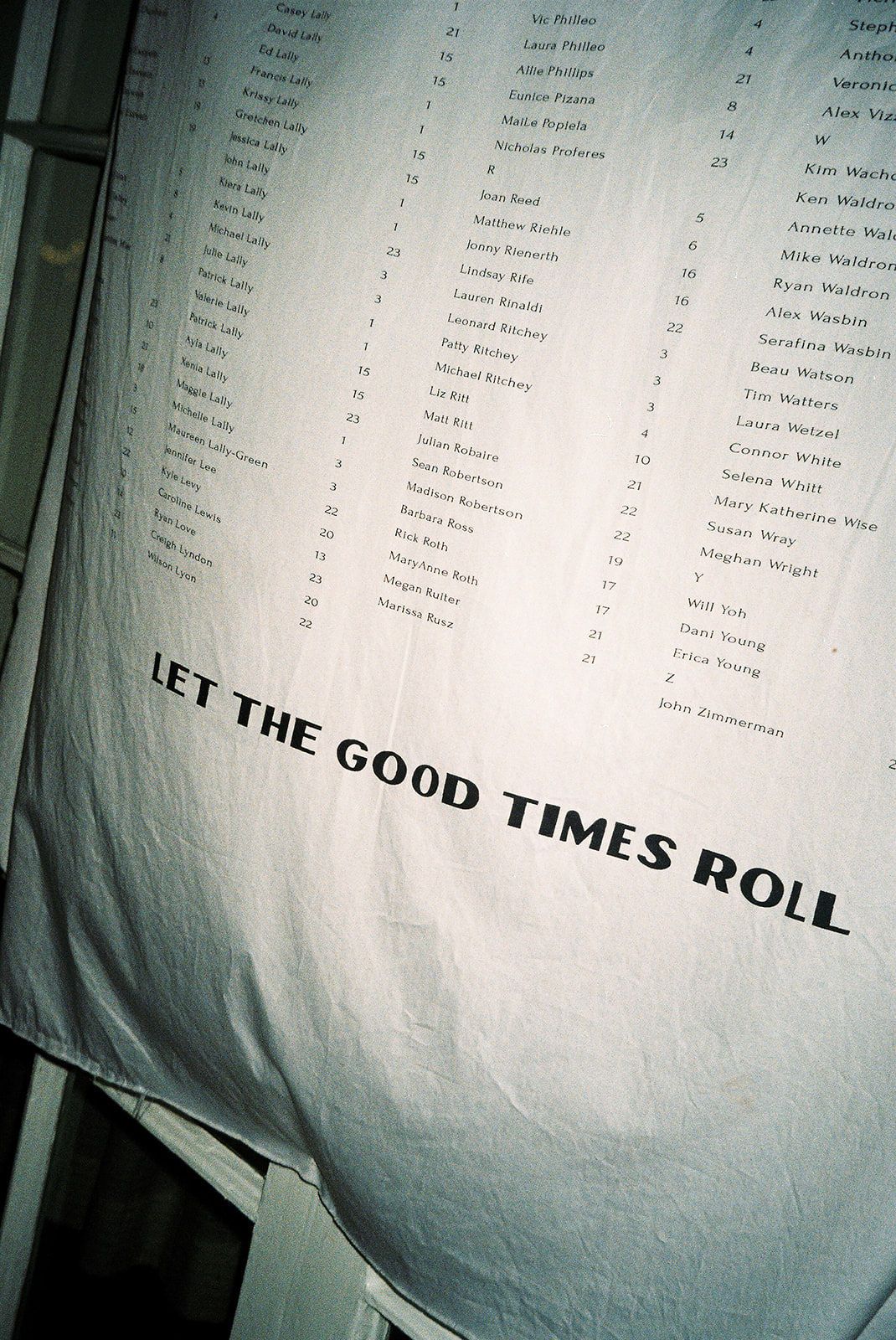 Text reading 'Let The Good Times Roll' displayed on a white surface in multiple overlapping images.