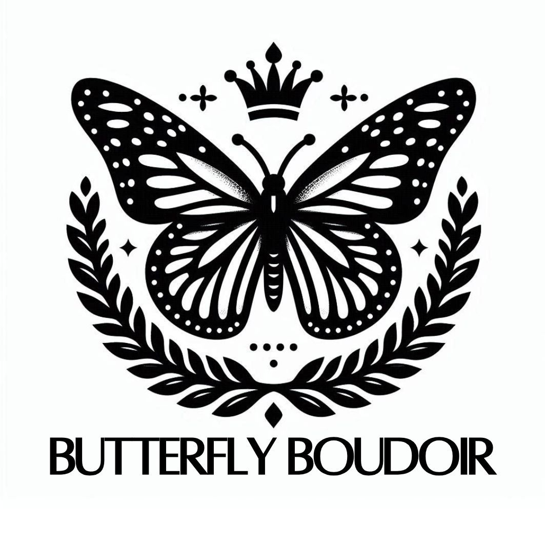 Black and white logo design featuring a butterfly, crown and laurel wreath for Butterfly Boudoir.