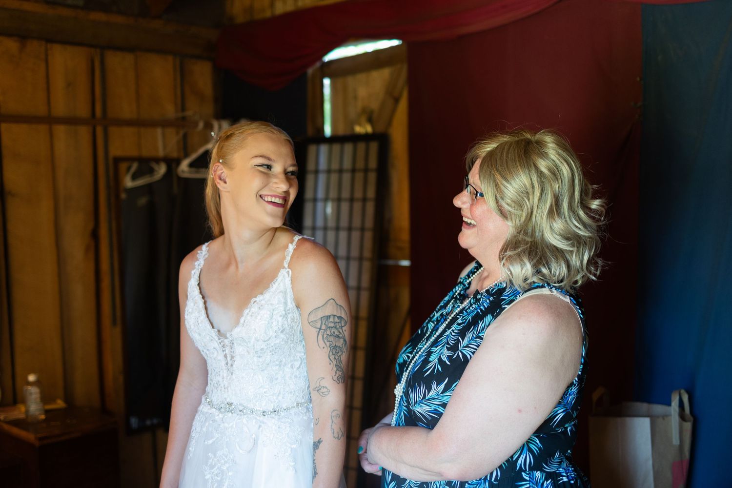 A sequence of four candid photos showing people chatting and laughing together at what appears to be a formal event.
