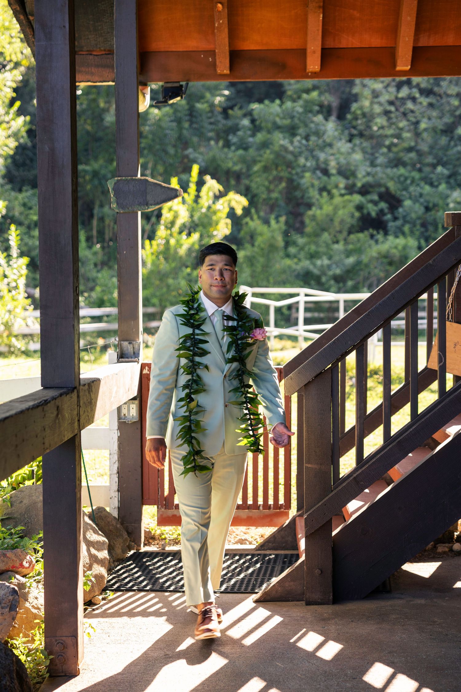 A series of photos showing a person walking down a covered wooden porch with sunlight casting dramatic shadows.