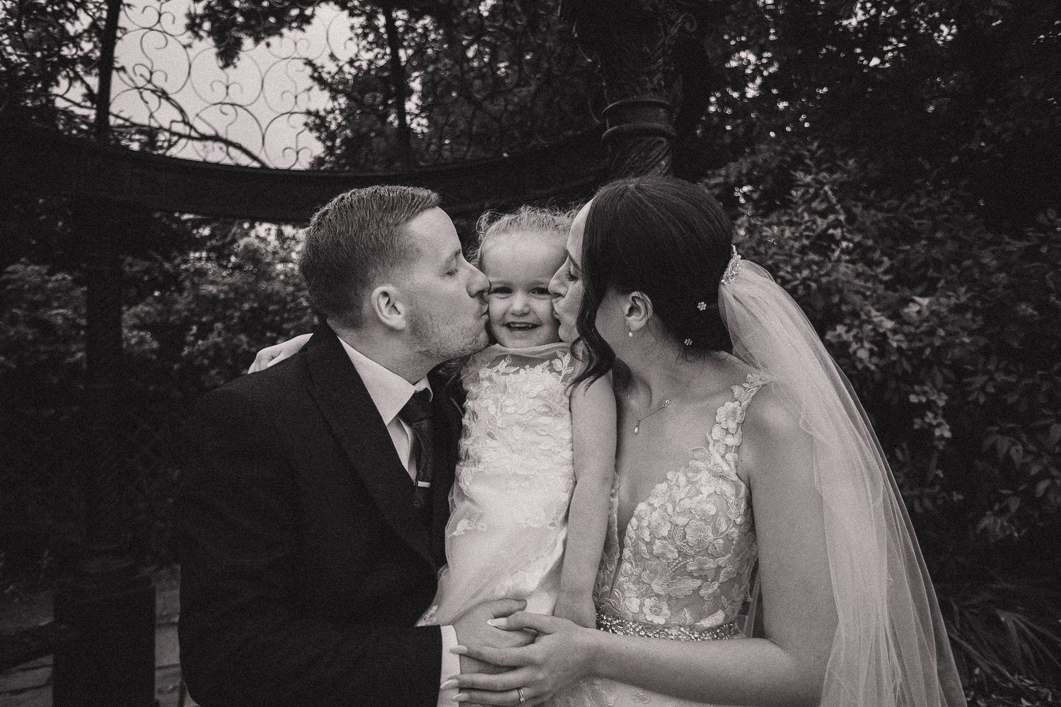 Intimate black and white wedding portraits showing tender moments.