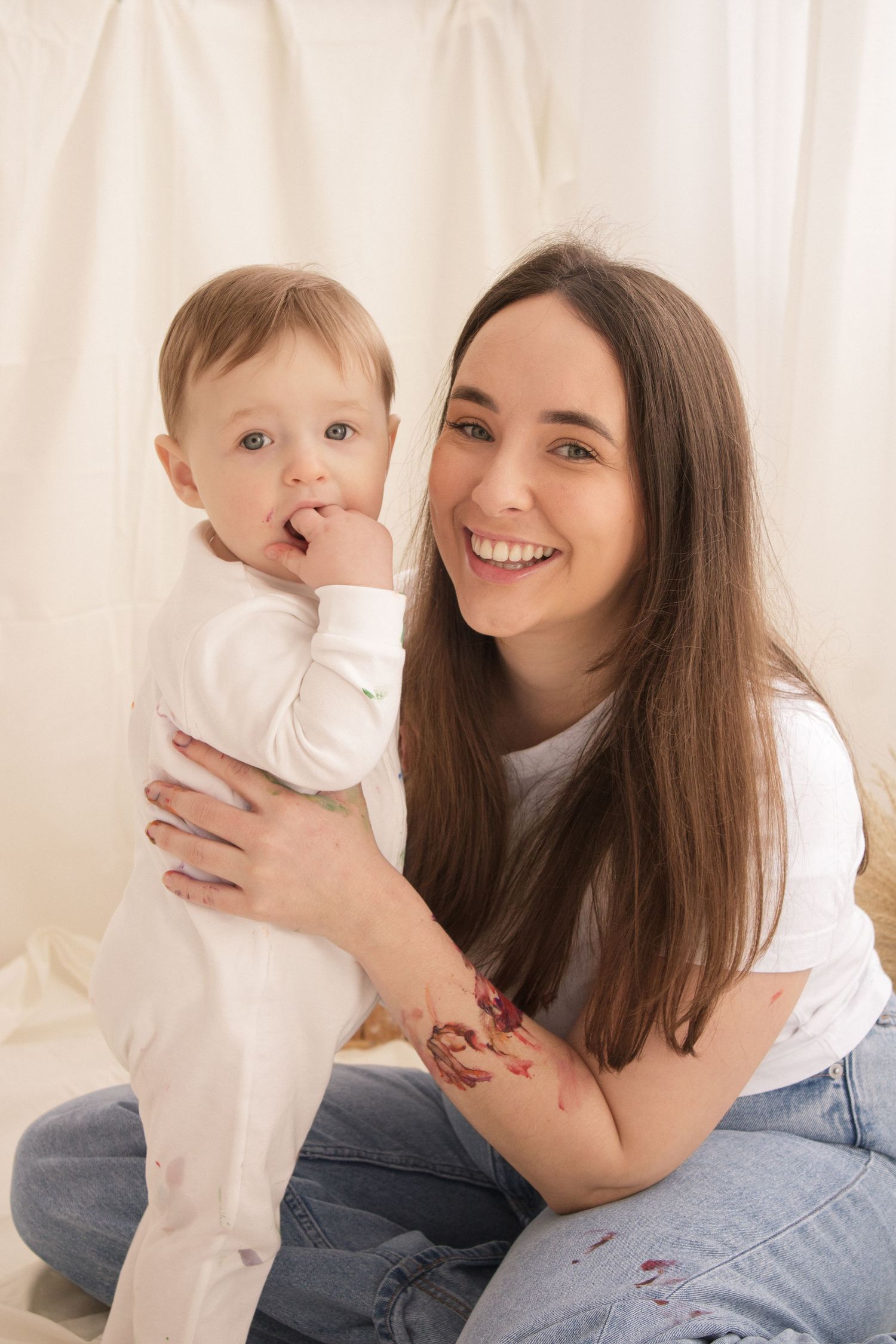 A series of candid photos showing tender moments between parent and child against a light background.