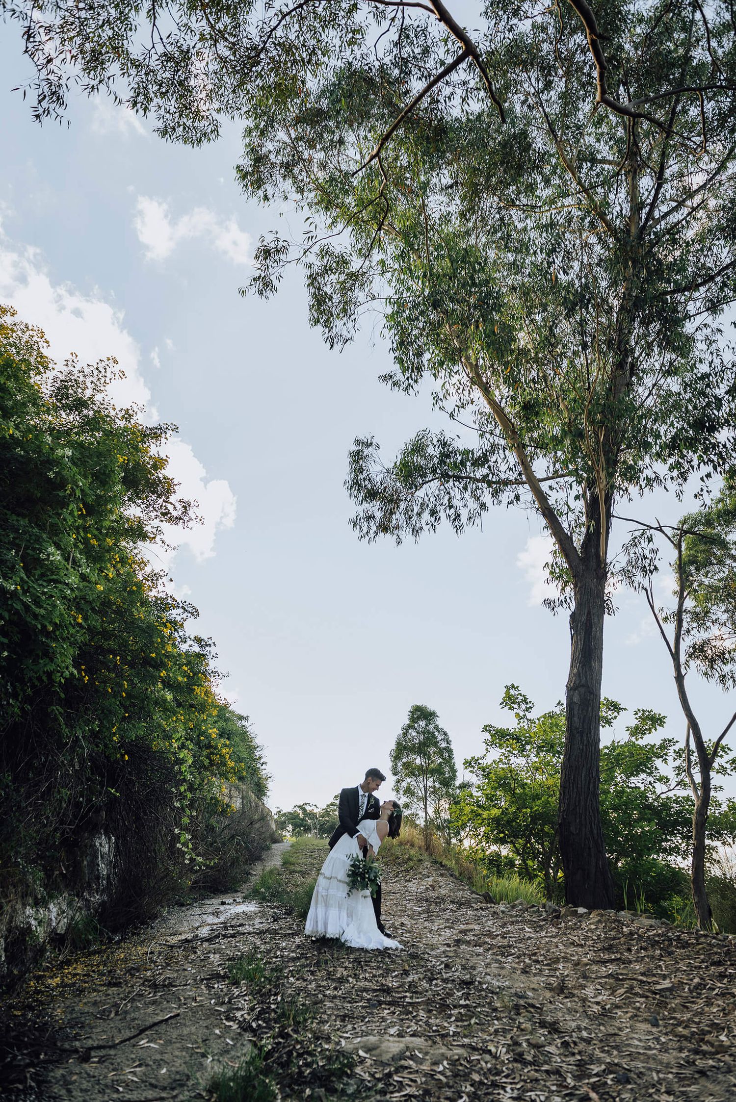 Groom dipping bride at Golden Jubilee Park in Wahroonga - Zara King Photography, Sydney Australia