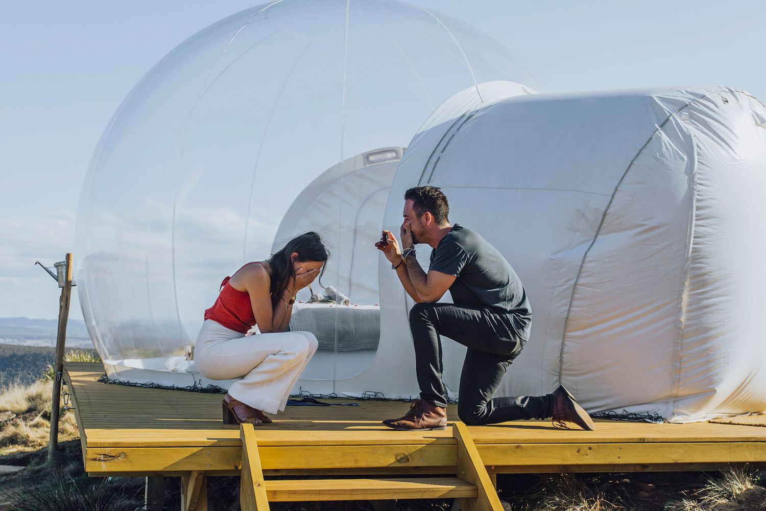 Man proposing to woman in front of a Bubble Tent in the Blue Mountains - Zara King Photography, Sydney Australia