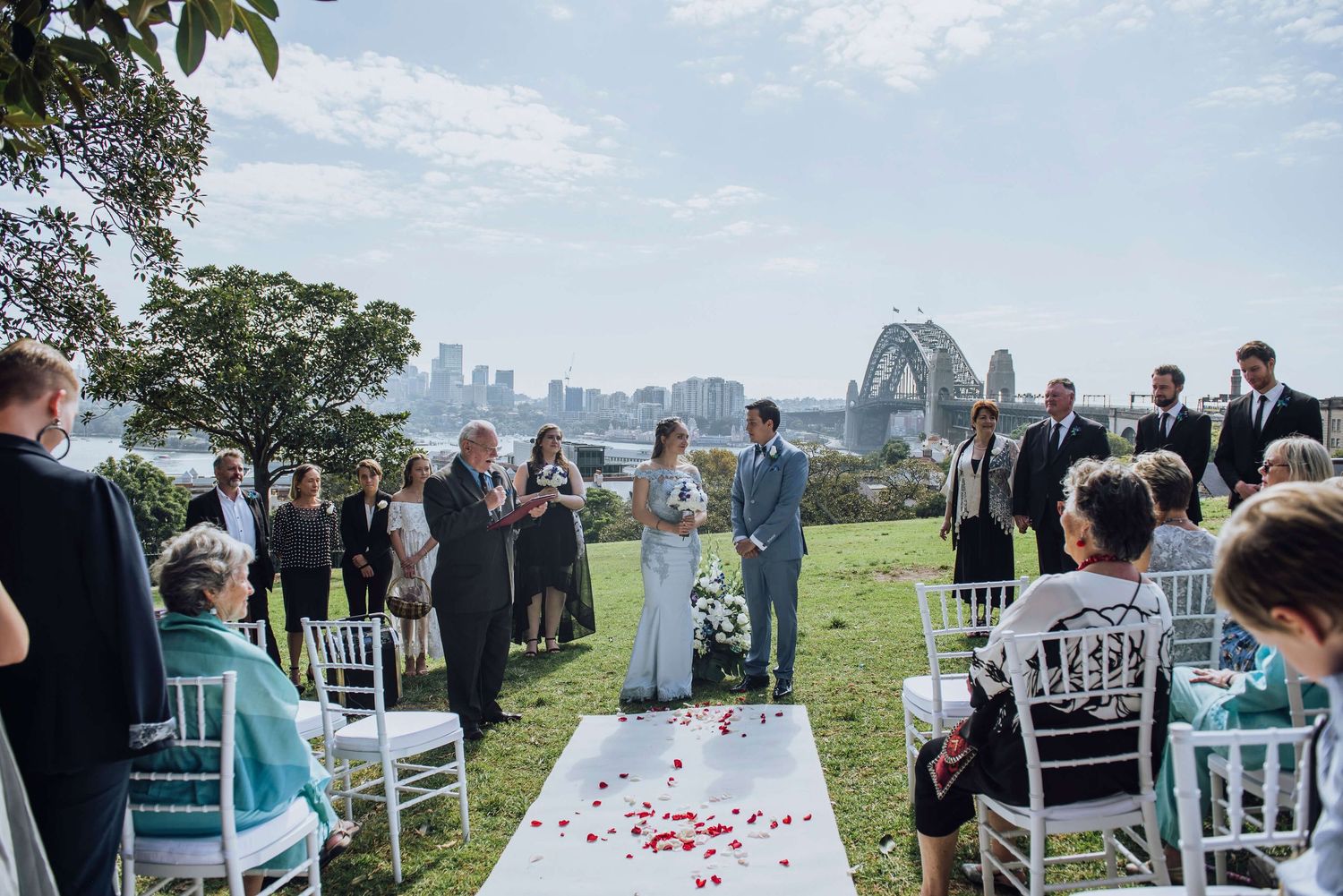 Bride and groom looking at each other during ceremony at Observatory Hill Park - Zara King Photography, Sydney Australia