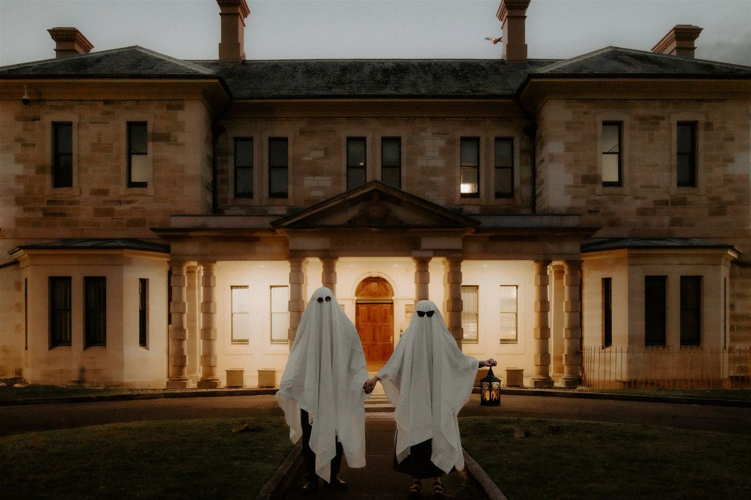 Zara King and fiancé wearing sheets to look like ghosts