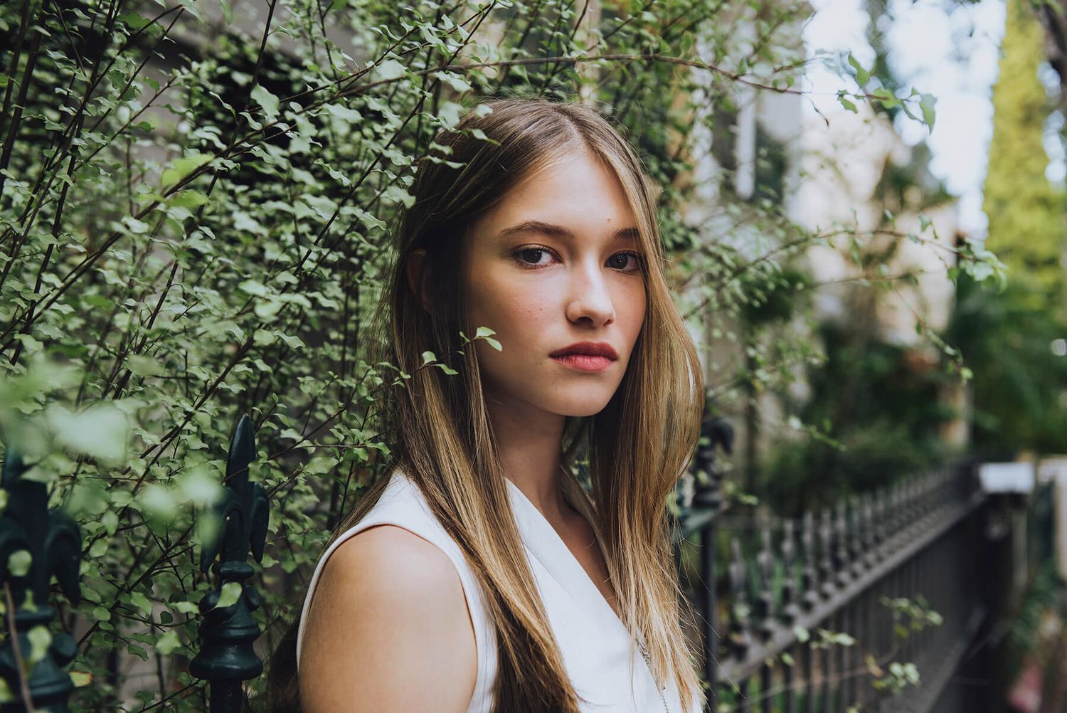 Girl standing amongst greenery during modelling photo shoot in Erskineville - Zara King Photography, Sydney Australia