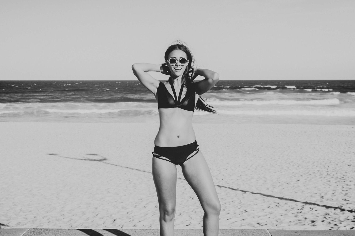 Girl in bikini wearing sunglasses at Maroubra - Zara King Photography, Sydney Australia
