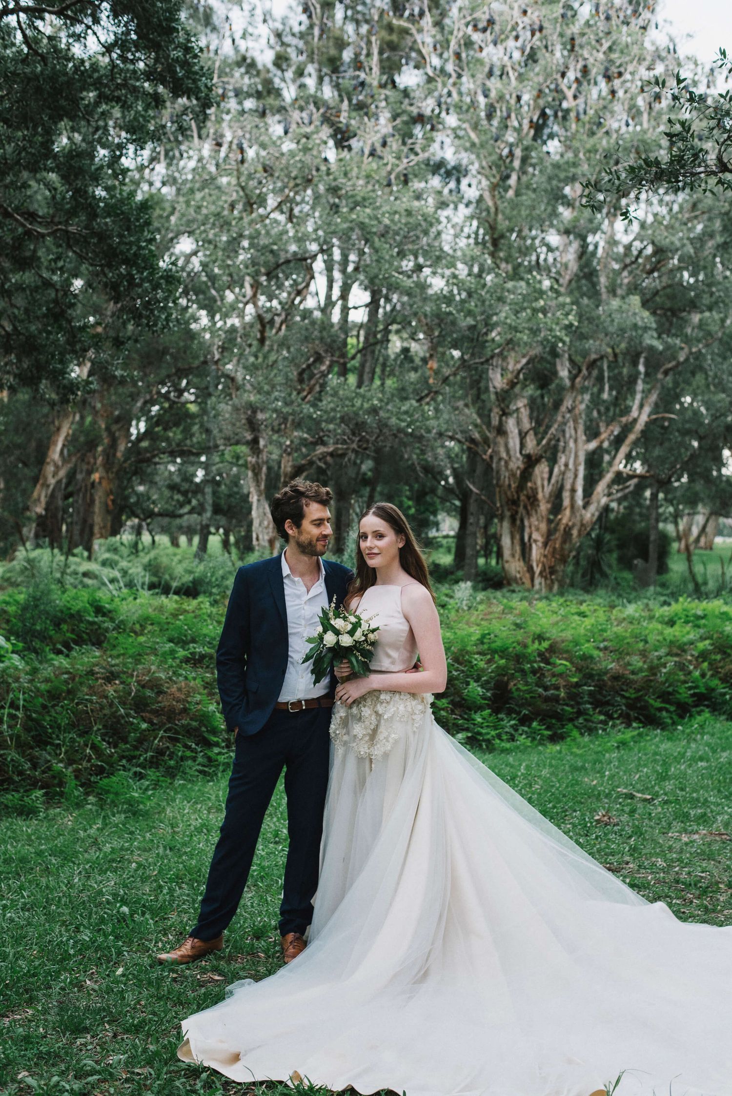 Editorial of groom looking at bride in Centennial Park - Zara King Photography, Sydney Australia