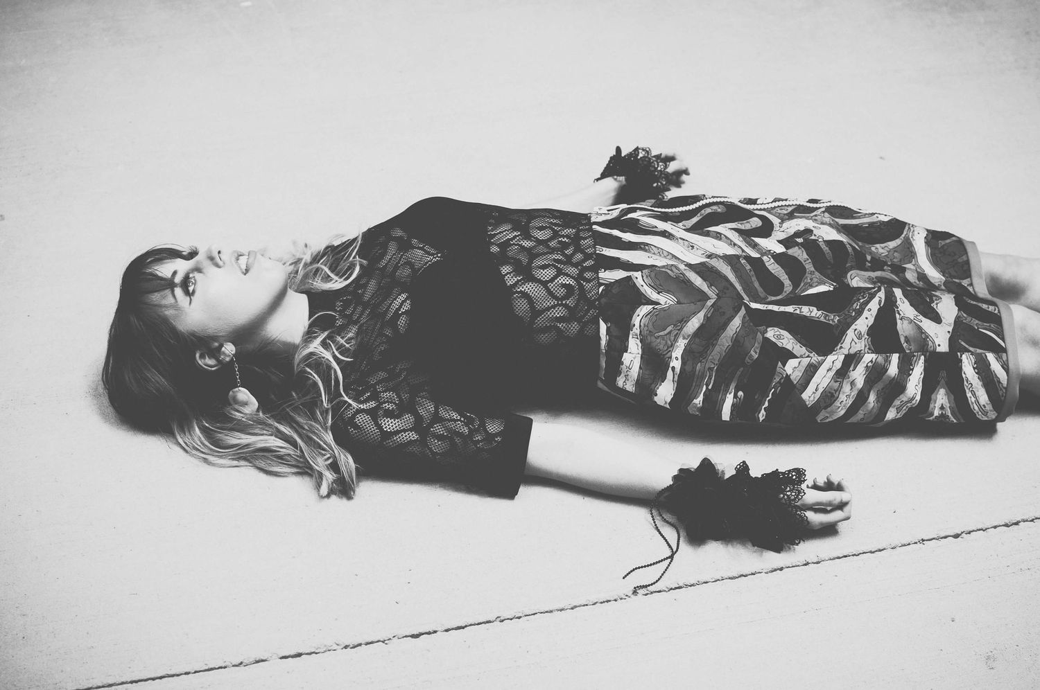 Girl lying on ground during e-commerce shoot in Newtown - Zara King Photography, Sydney Australia