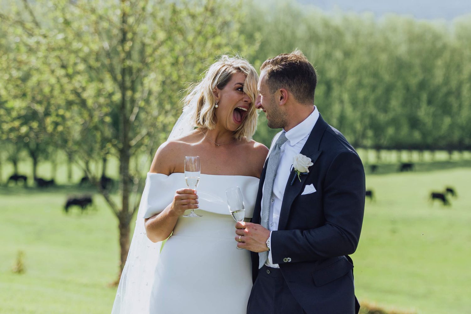 Bride opens mouth really wide in excitement towards groom during ceremony in Kangaroo Valley - Zara King Photography, Sydney Australia