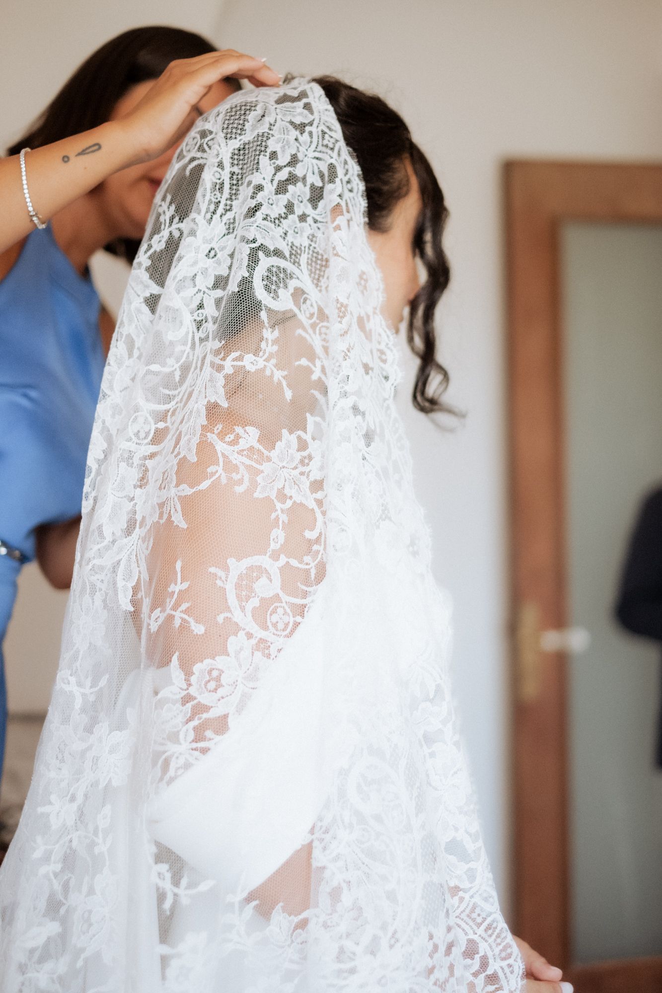 Delicate white lace veil flowing gracefully in a series of elegant bridal preparation shots.