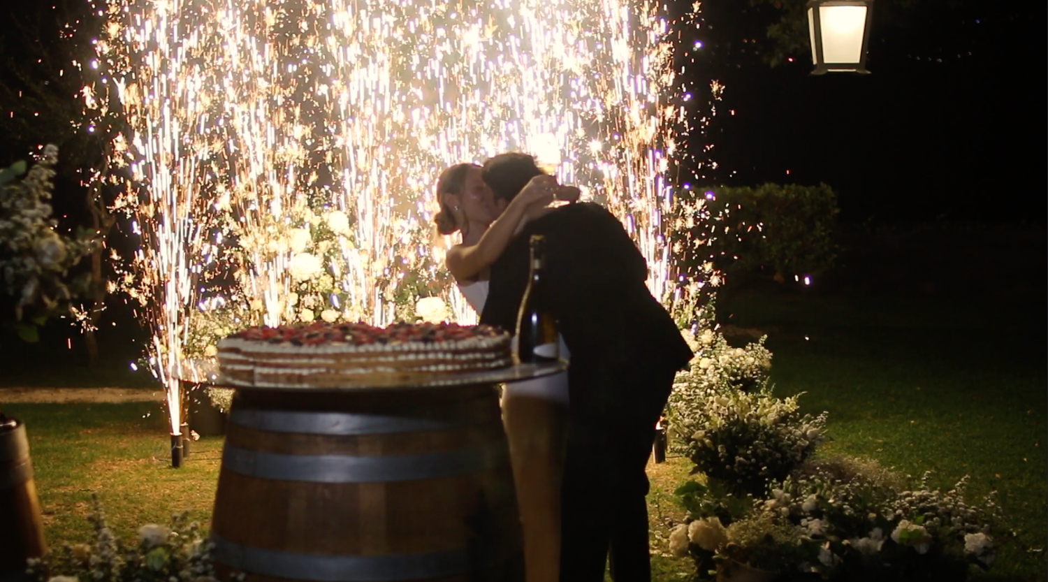 Nighttime celebration with sparklers creating magical light trails.