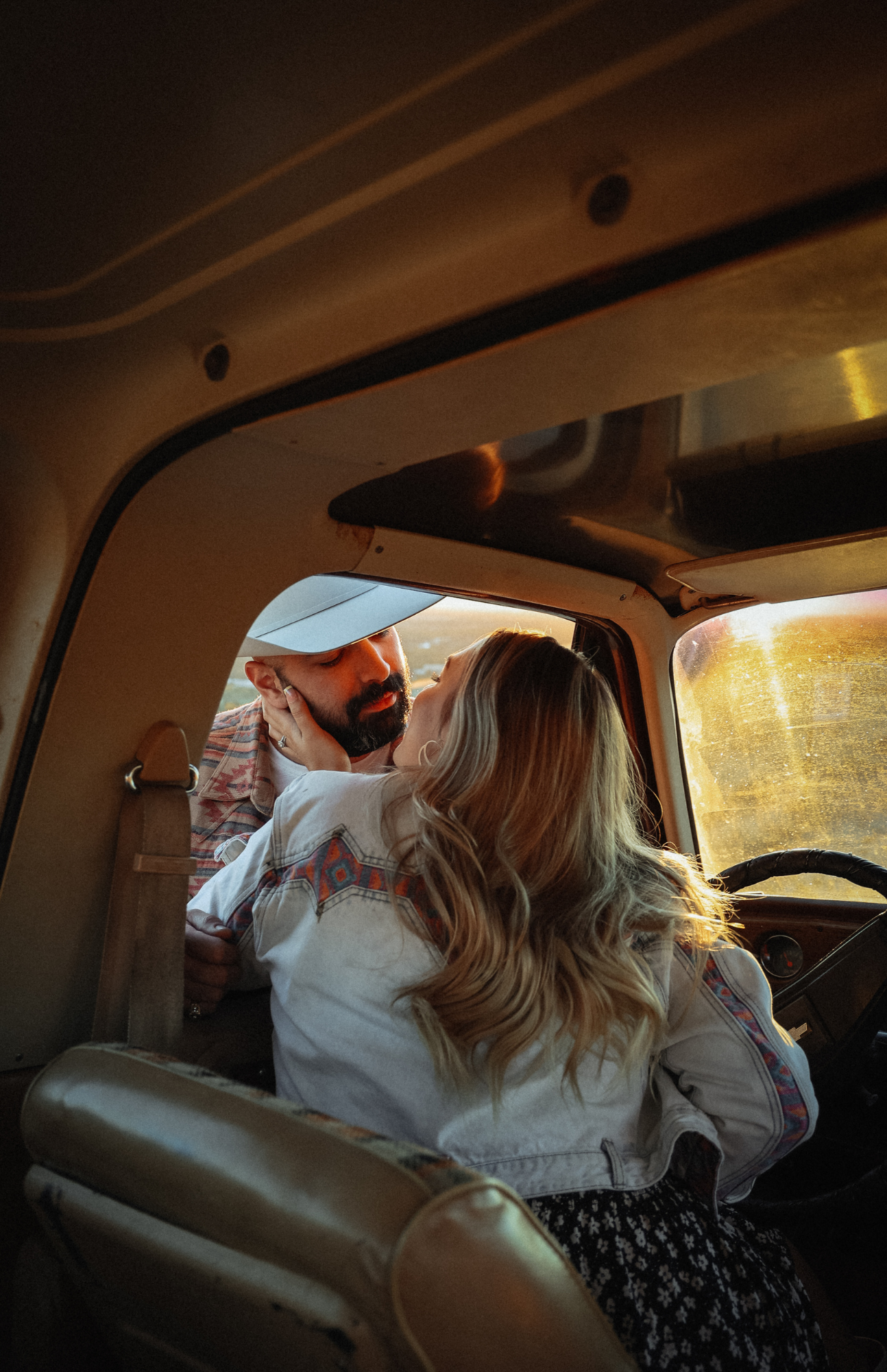 A sequence of photos showing a couple in the back seat of a car sharing intimate moments.