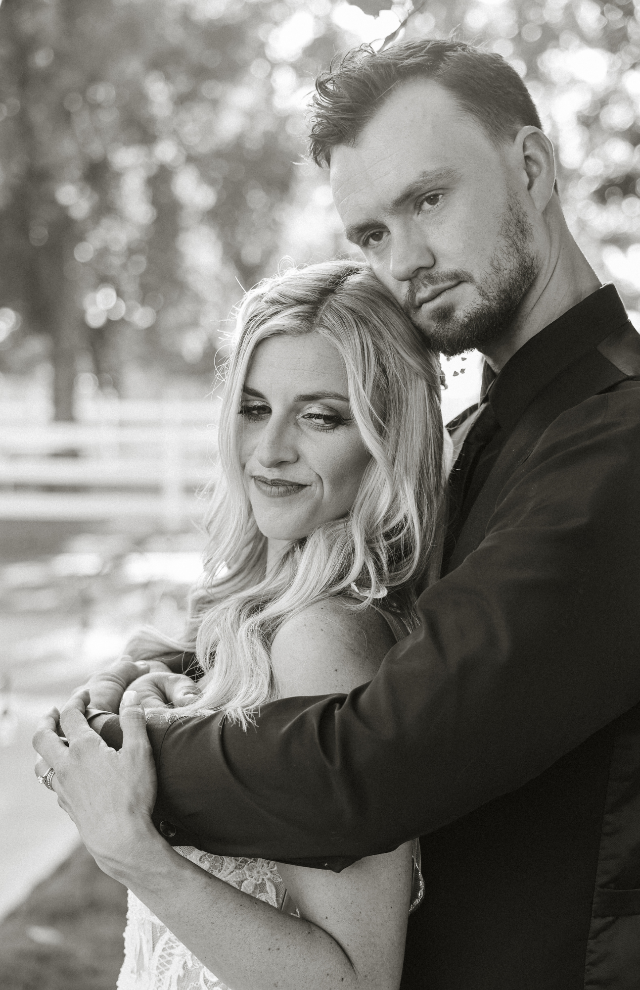 Black and white romantic couple portraits showing intimate embraces and tender moments.