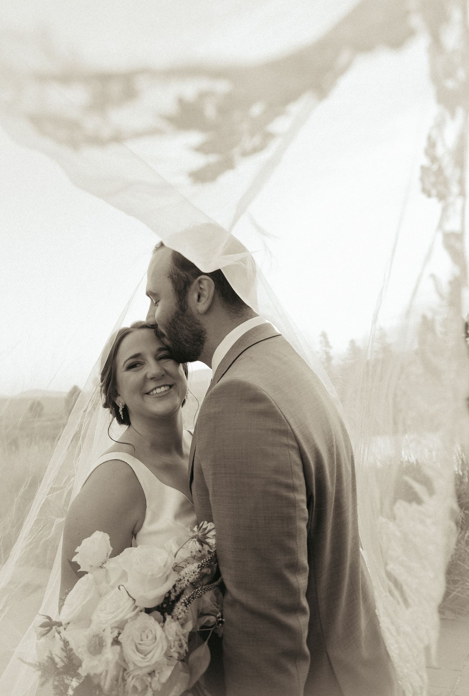 A romantic sepia-toned wedding portrait sequence showing tender moments.