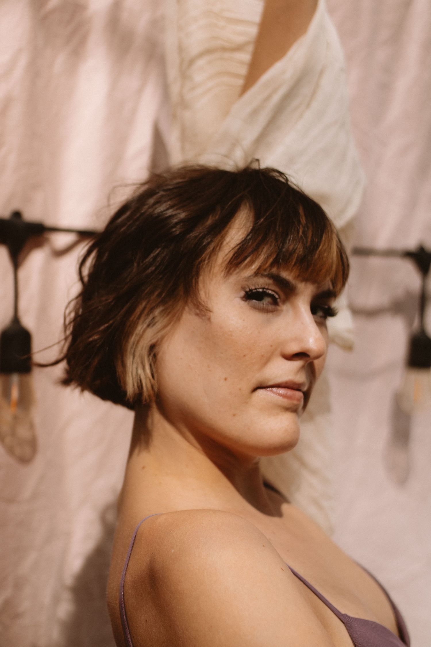 Warm-toned portrait series against a neutral background.
