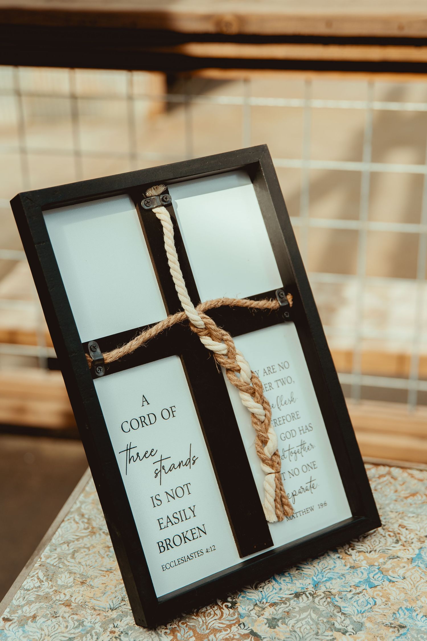Framed wooden cross decoration with rope and Ecclesiastes 4:12 cord of three strands Bible verse for wedding ceremony.