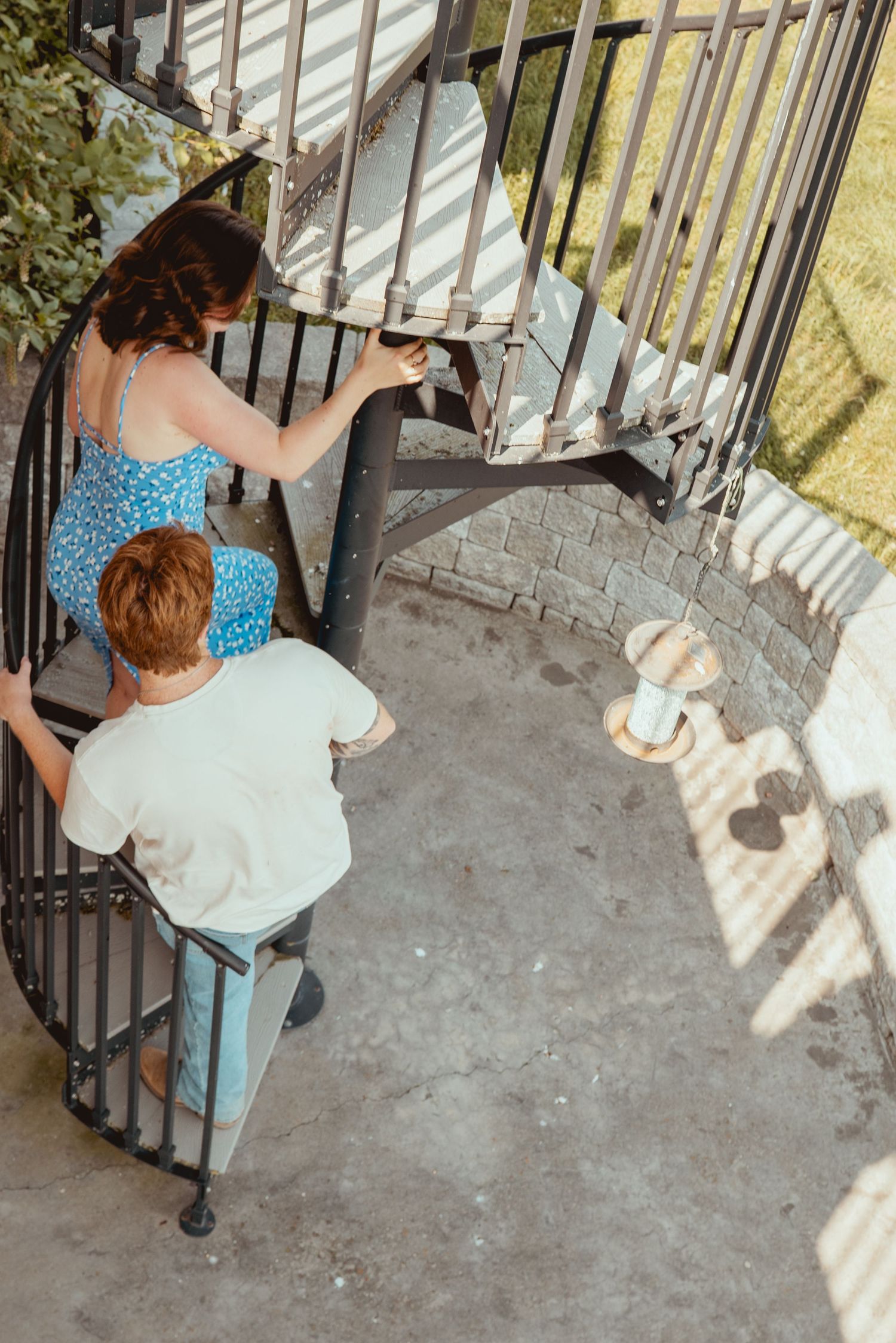 A series of photos showing someone unlocking and opening a metal gate on a concrete porch.