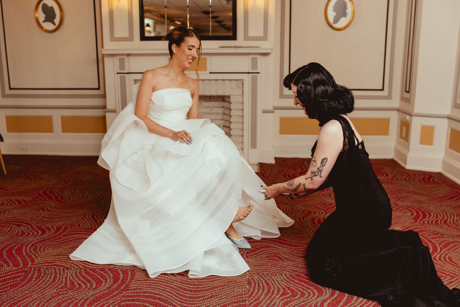 A series of photos showing someone in a white wedding dress getting makeup applied while seated in an elegant room.