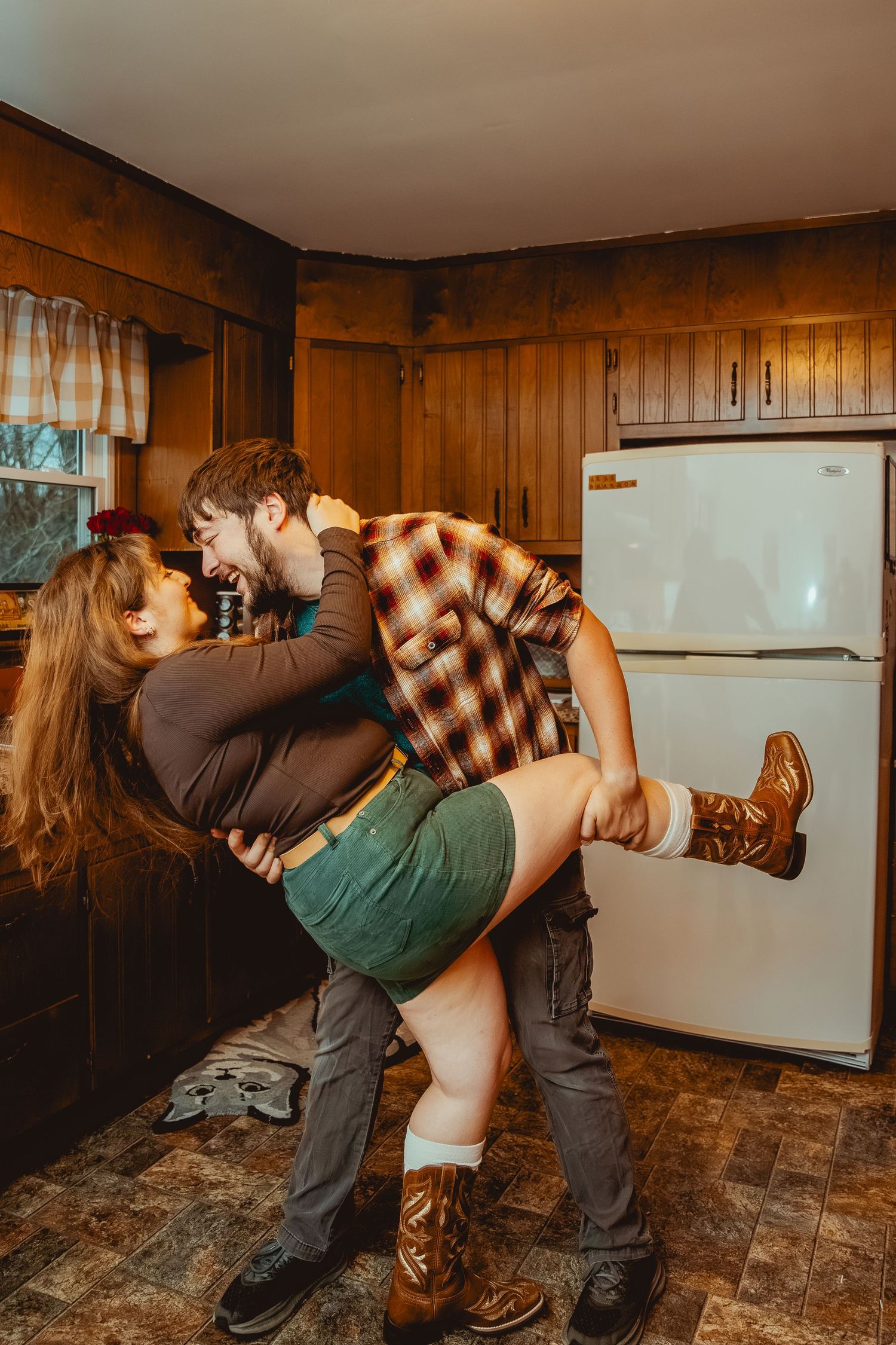 A sequence of dance moves showing two people performing a dramatic dip on a rustic wooden floor.
