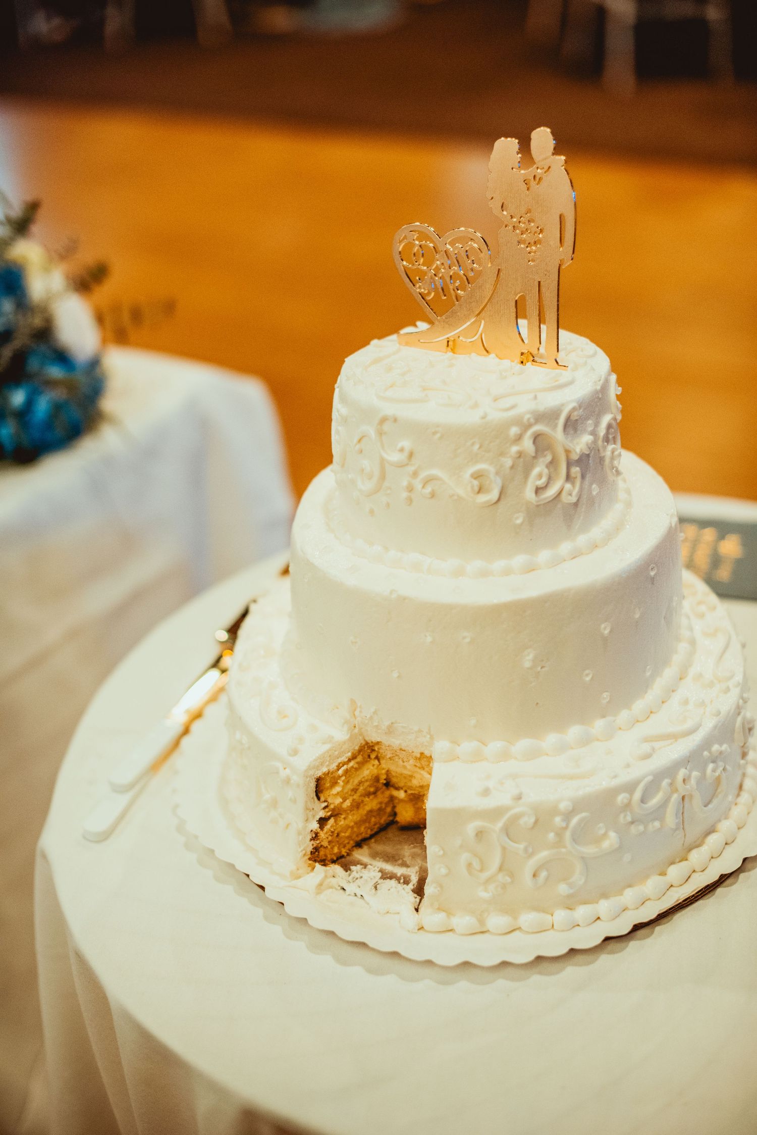 Series of white wedding cake photos showing progressive damage as pieces are removed from the decorated tiers.